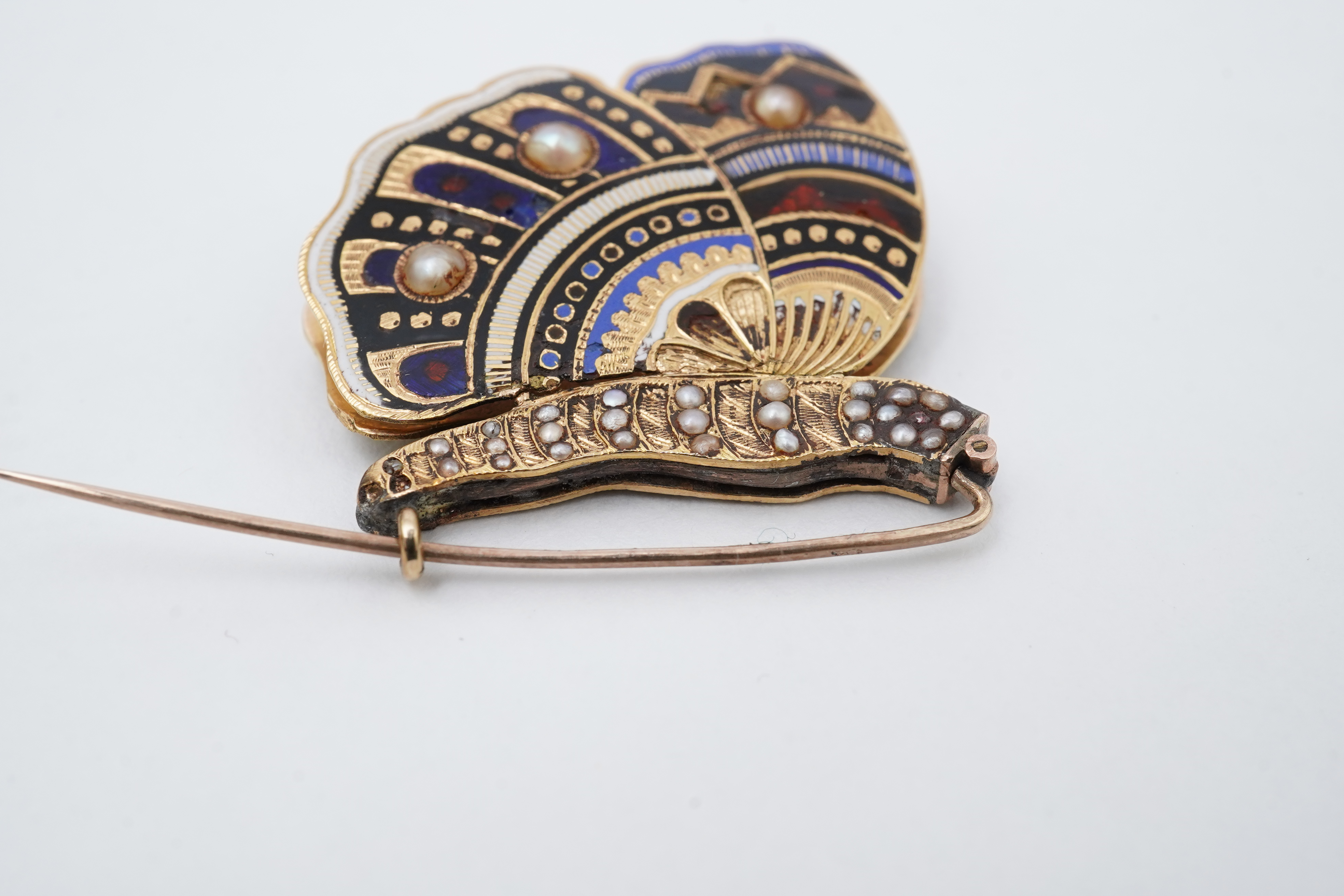 An enamel and seed pearl brooch, circa 1840